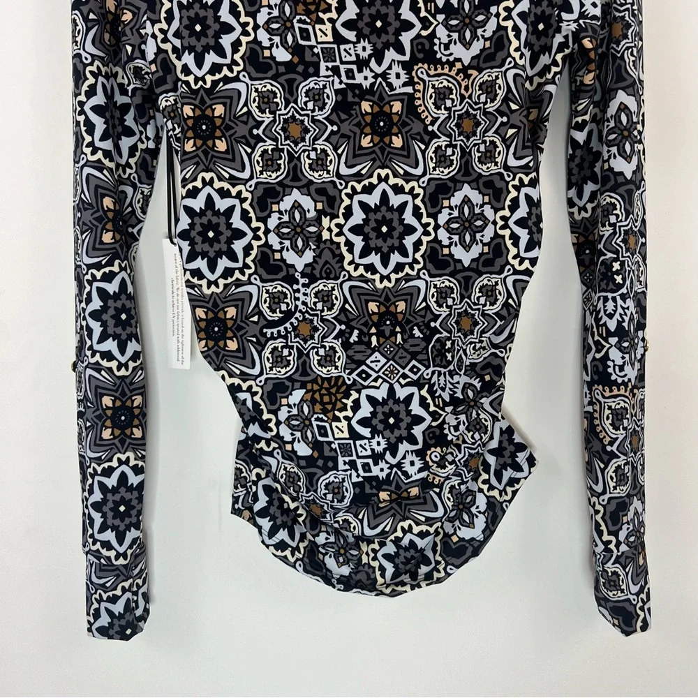 Ambernoon II by Dr. Erum Ilyas Floral Print 1/4 Zip Roll Tab Sleeve Rash Guard
